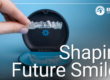 hand holding clear aligners