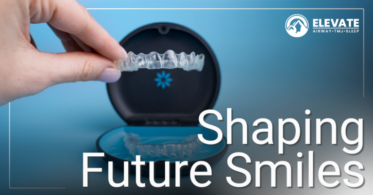 hand holding clear aligners